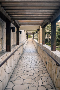 Empty footpath leading towards building