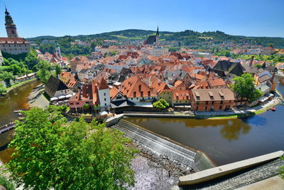 High angle view of river and city against clear sky