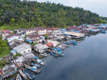 High angle view of townscape by trees and buildings