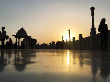 Silhouette of buildings at sunset