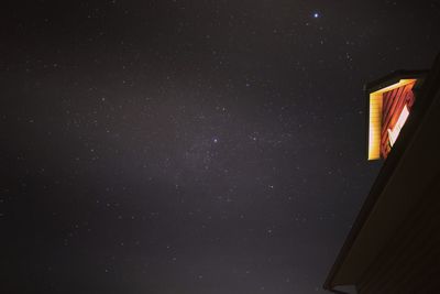 Low angle view of building against sky at night