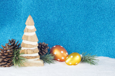 Close-up of christmas decoration on fake snow