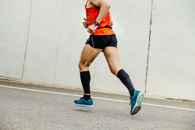Full length of man running
