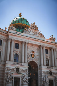 Low angle view of historic building against clear sky