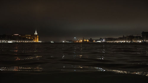 View of city lit up at night