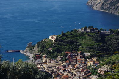 High angle view of town by sea