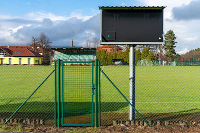 Close-up of basketball hoop against sky