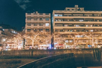 View of city lit up at night