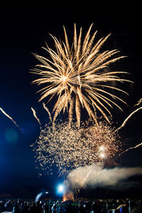 Firework display at night