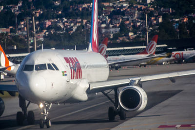 View of airplane at airport runway