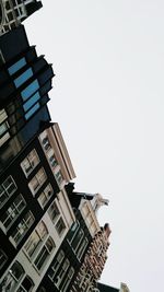 Low angle view of buildings against clear sky