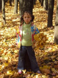 Portrait of girl standing outdoors