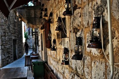 Close-up of clothes hanging on wall