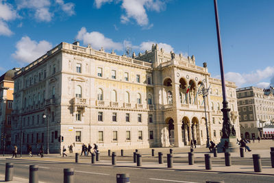 Group of people in front of historical building