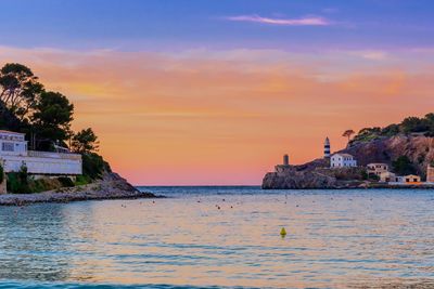 Scenic view of sea against orange sky