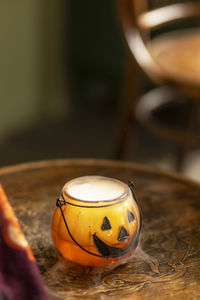 Close-up of coffee cup on table