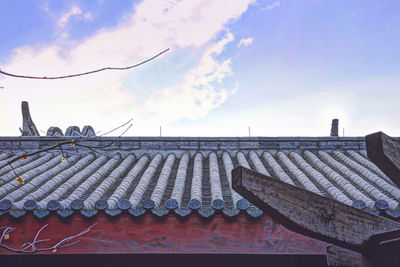 Low angle view of building against blue sky