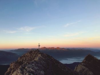 Scenic view of mountains against sky during sunset
