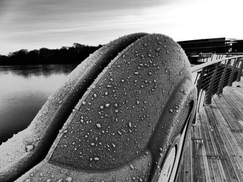 Close-up of lake against sky