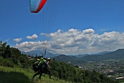 Landscape with mountain range in background