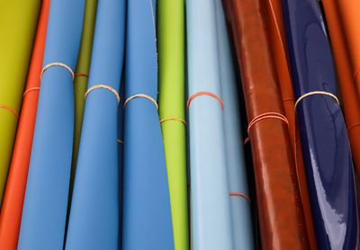 Detailed close up view on samples of cloth and fabrics in different colors found at a fabrics market