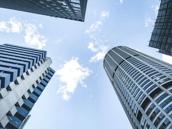 Low angle view of skyscrapers against sky