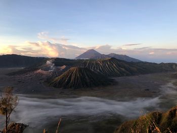 View of volcanic landscape against sky