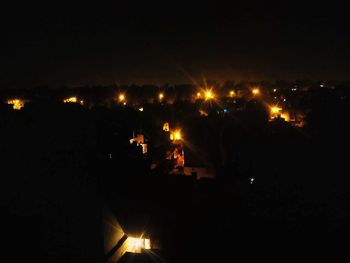 Illuminated cityscape at night