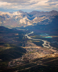 High angle view of snowcapped mountains against sky