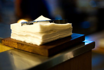 Close-up of tissues on table