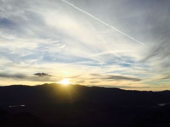 Scenic view of landscape against sky during sunset