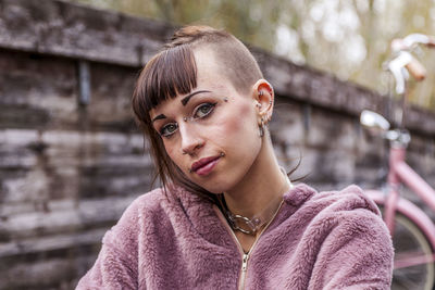 Portrait of smiling young woman outdoors