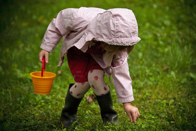 Girl playing in grass