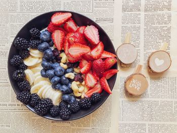 Directly above shot of fruit salad in bowl on table