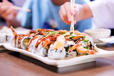 Close-up of sushi served on table