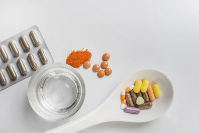 High angle view of food on table against white background