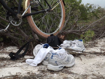 High angle view of abandoned bicycle on field