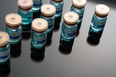 High angle view of bottles on table