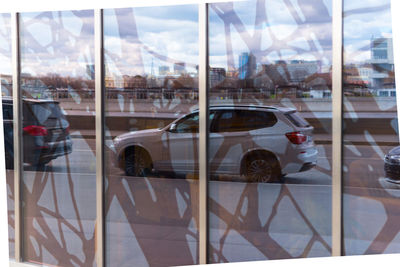 Reflection of sky on car window