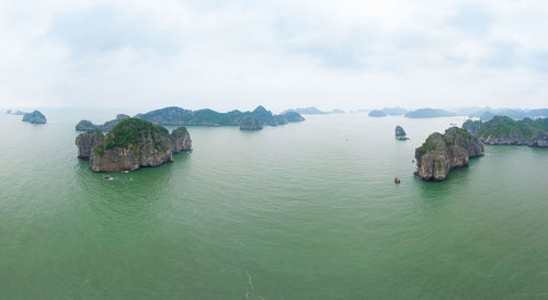 Scenic view of bay against sky