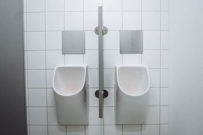 Urinals in empty public restroom