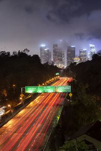 High angle view of light trails on street in city