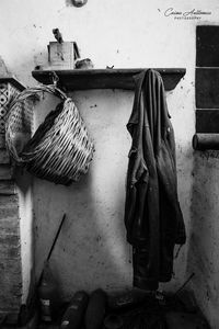 Clothes drying against wall in old building