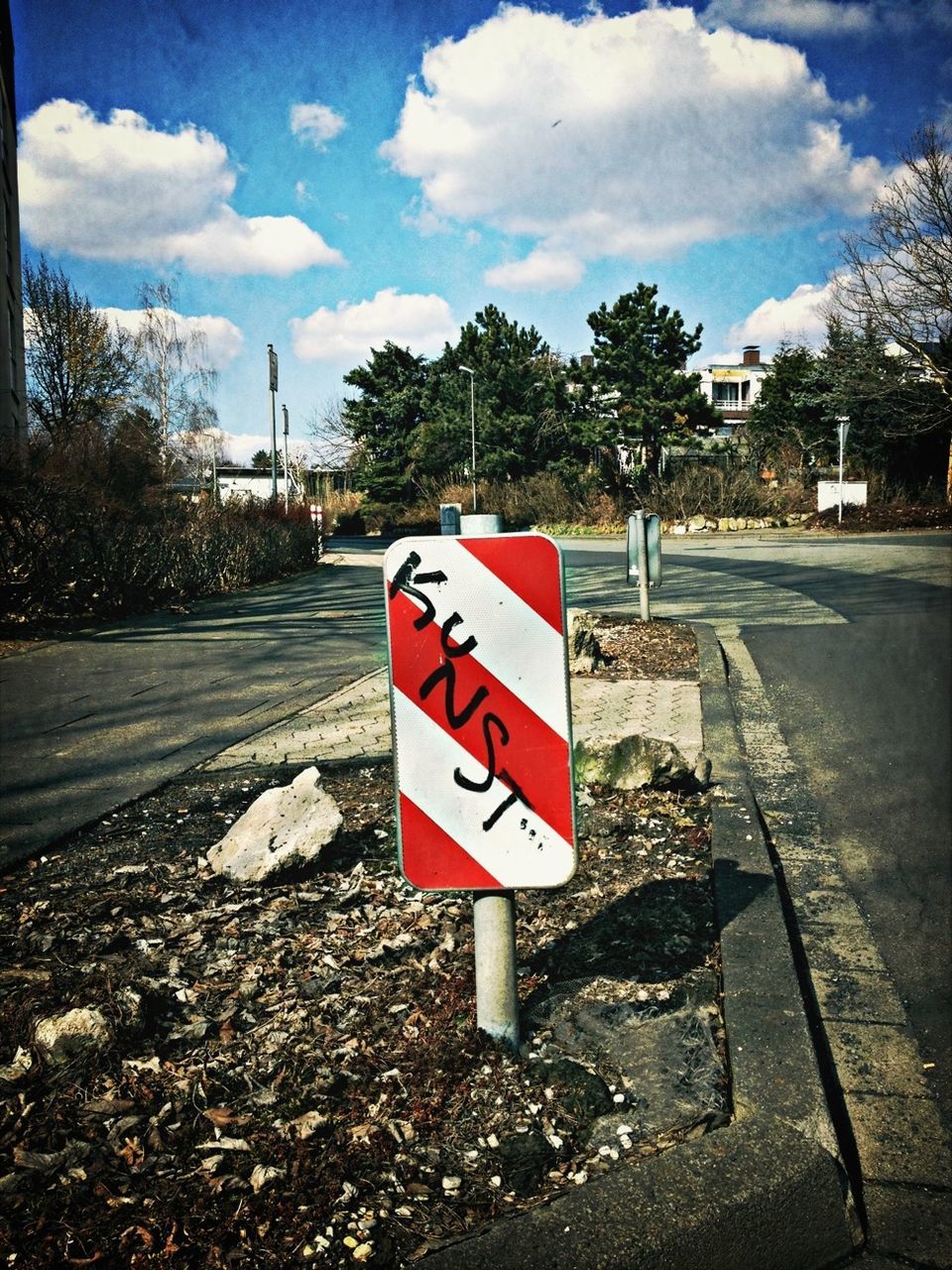 sky, road sign, red, road, communication, transportation, guidance, text, western script, sign, information sign, cloud - sky, warning sign, the way forward, tree, street, cloud, road marking, asphalt, day