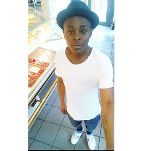 Portrait of young man looking away in store