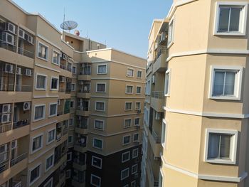 Low angle view of buildings against clear sky