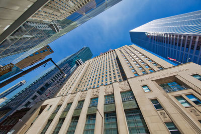 Low angle view of modern buildings against sky