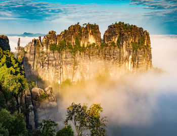 Schrammsteine rock formations stand in an area known as saxon switzerland, germany, along elbe river