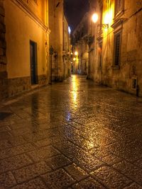 Illuminated street at night