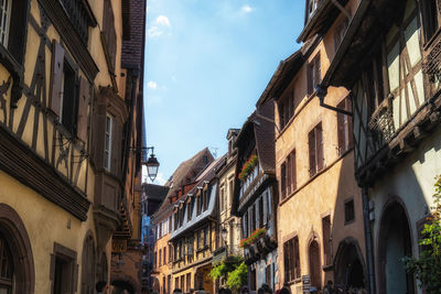 Riquewihr historical town timbered houses along the narrow cobble stoned street. taken in riquewihr.